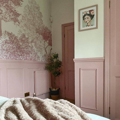 Purple trees wallpaper behind luxury seating area with trees