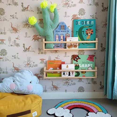 Papel de parede de dinossauros estilizado com flores e mesa vintage cinza