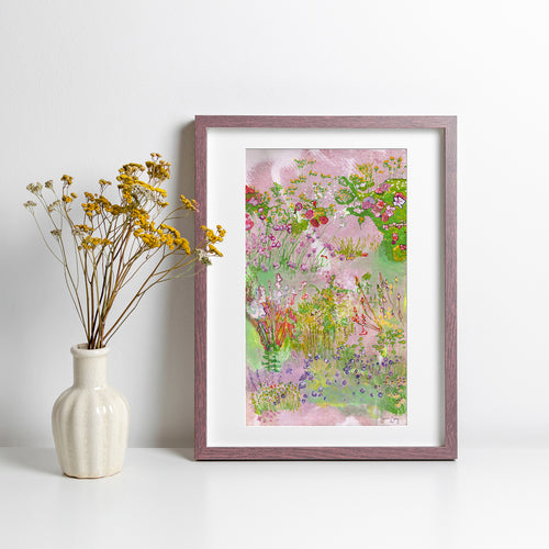 Framed print depicting abstracted, colourful flowers
