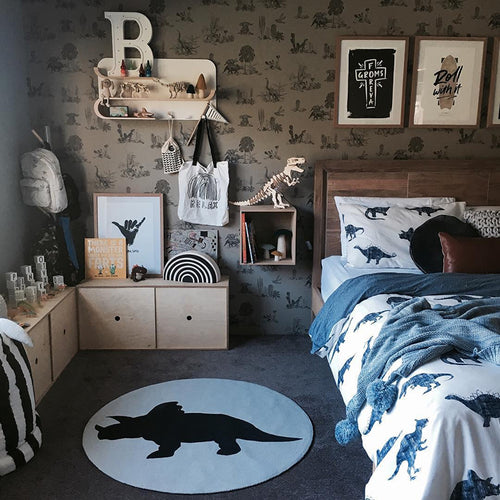 neutral coloured illustrated dinosaur wallpaper by Sian Zeng in situ