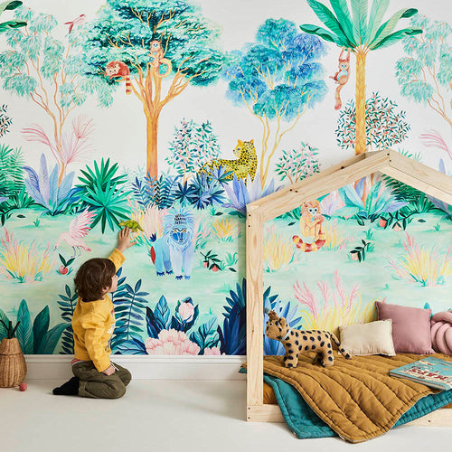 colourful bold jungle animals magnetic wallpaper mural in children's room with boy playing with magnets