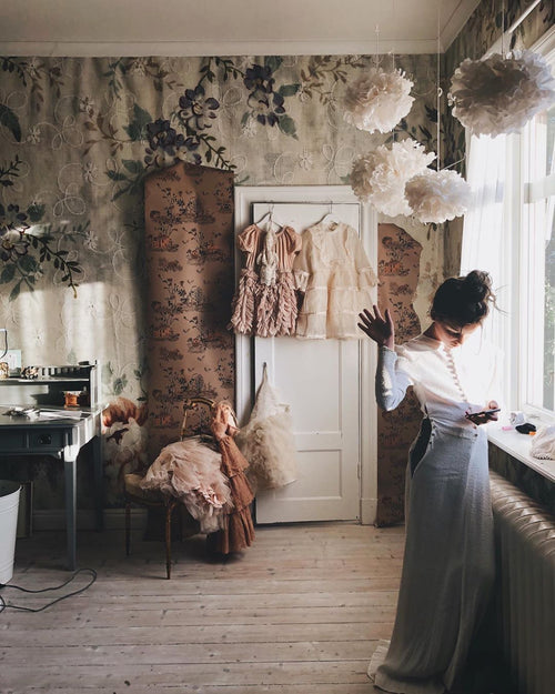 Woodlands Brown Pink Wallpaper with table Sian Zeng