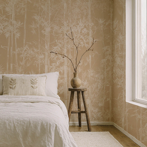 Bedroom with bamboo beige wallpaper, bed, and wooden stool with vase and branches.
