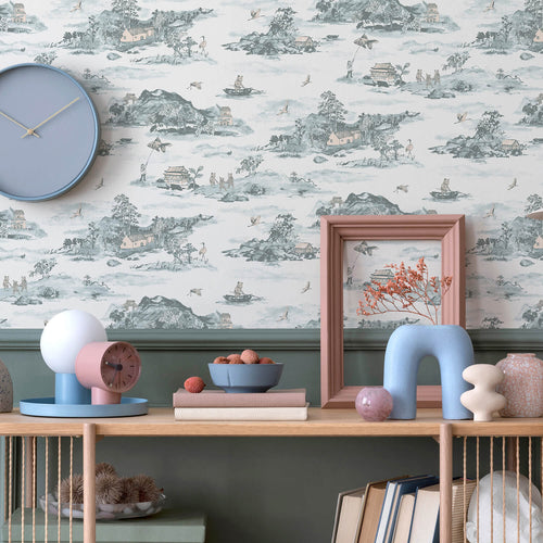 Blue and pink children's room with children's wallpaper on the wall