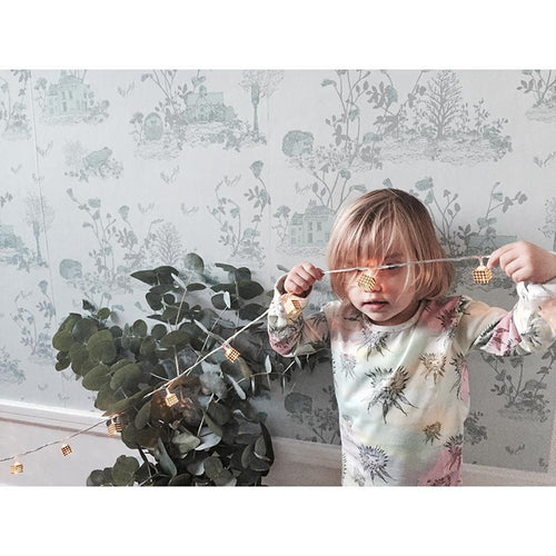 Woodlands Blue Wallpaper behind cabinet Sian Zeng